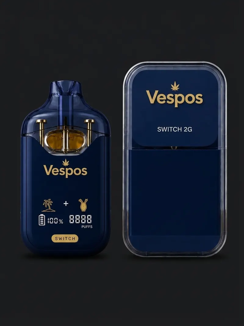 Vespos Switch 2G dual-chamber device with blister pack on a dark studio surface